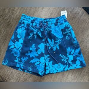 NWT Free People Sprint to the Finish Blue Floral Printed Shorts. Size XS